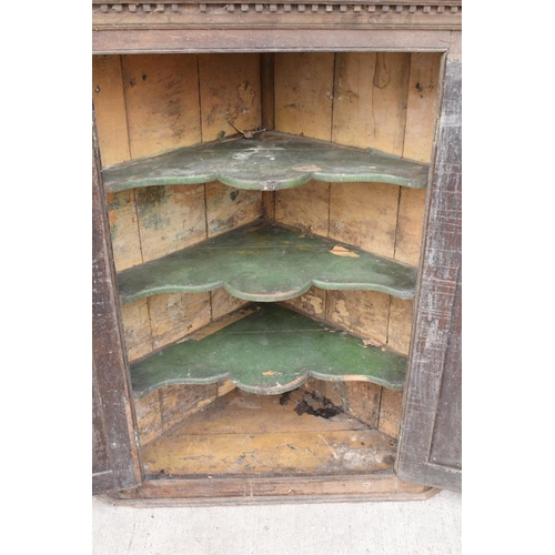 360 - Large early 19th century oak farmhouse double corner cupboard. 138cm tall. 113cm widest. 62cm deepes... 