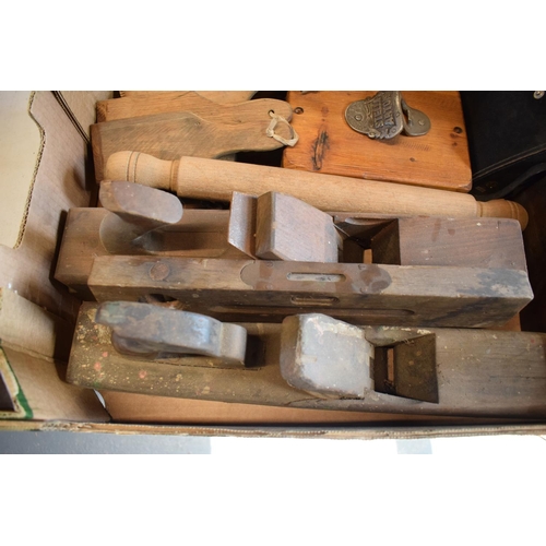 202 - A mixed collection of items to include wooden planes, Hanimex 8x30 binoculars in case, vintage rolli... 