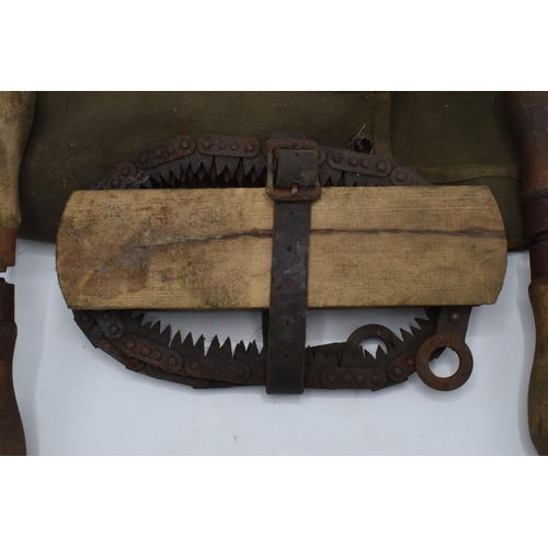 210 - Army folding saw in a carry bag