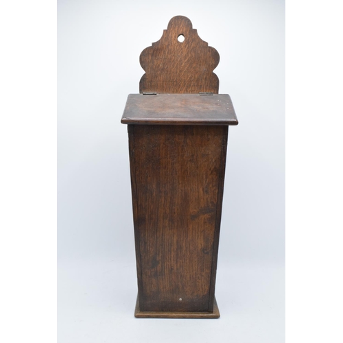 211 - A Victorian wooden candle box / salt box with working hinges. 54cm tall. Generally in good condition... 