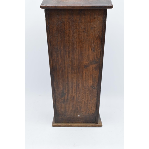 211 - A Victorian wooden candle box / salt box with working hinges. 54cm tall. Generally in good condition... 