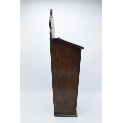 211 - A Victorian wooden candle box / salt box with working hinges. 54cm tall. Generally in good condition... 