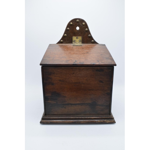 213 - A 19th century Victorian wooden candle box/ salt box with lift up lid and brass beading. 38cm tall. ... 