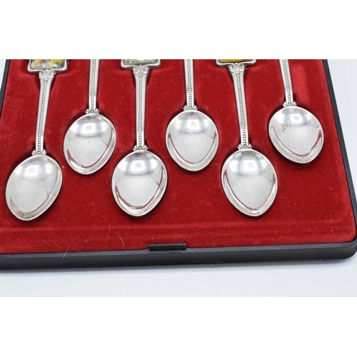 228 - A cased set of 6 souvenir teaspoons by Perfection with a Waltzing Mailtida/ New Zealand design (Hing... 