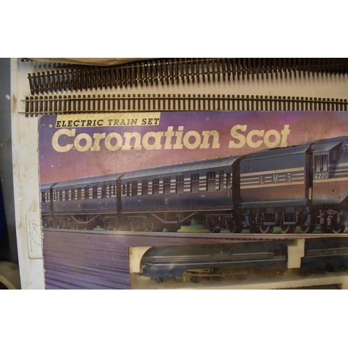 229 - A boxed Hornby Coronation Scot electric train set R.386 together with Hornby metre length and simila... 