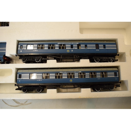 229 - A boxed Hornby Coronation Scot electric train set R.386 together with Hornby metre length and simila... 