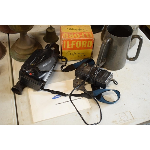 230 - A mixed collection of items to include 2 late Victorian/ early 20th century copper kettles, one with... 