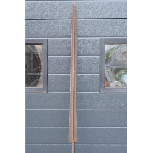 232 - A steel spear, assumed African and believed to be of Zulu origin. 210cm in length.