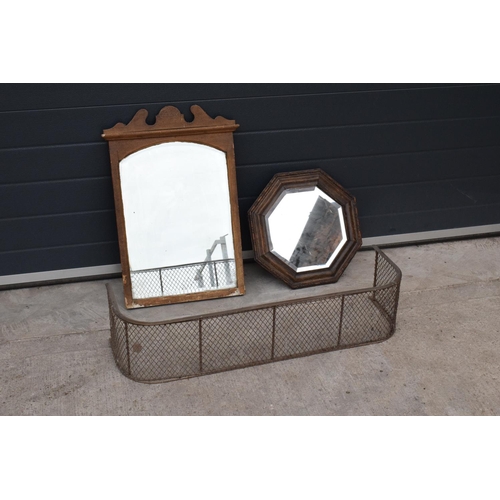 234 - A collection of items to include a carved oak octagonal mirror, a rectangular mirror and a brass and... 