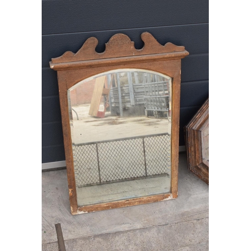 234 - A collection of items to include a carved oak octagonal mirror, a rectangular mirror and a brass and... 