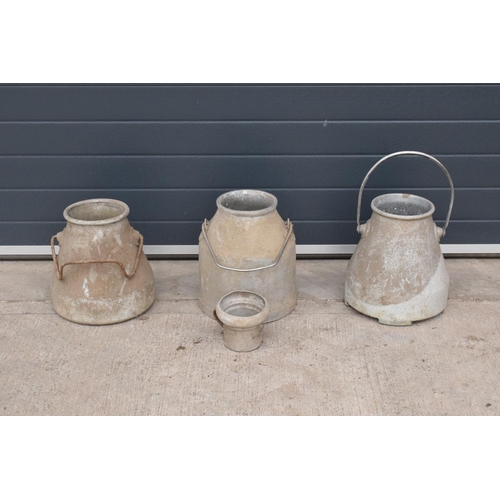 241 - A collection of aluminium milk churns/ buckets/ pails with handles and one smaller similar item (4).... 