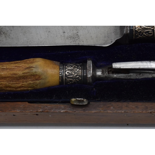 250 - A wooden cased Mappin and Webb horn and silver handled 7-piece carving set with silver banding and t... 