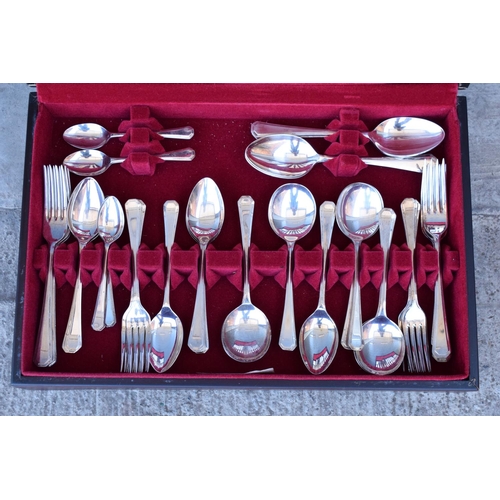 255 - A 20th century cased steel and EPNS cutlery canteen to include knives, forks, spoons, tea spoons etc... 