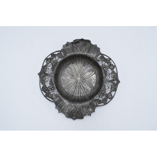 256 - An Art Nouveau WMF pewter dish raised on 4 ball feet stamped 'WMF'. 26cm long .In good condition wit... 