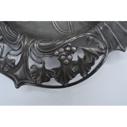 256 - An Art Nouveau WMF pewter dish raised on 4 ball feet stamped 'WMF'. 26cm long .In good condition wit... 