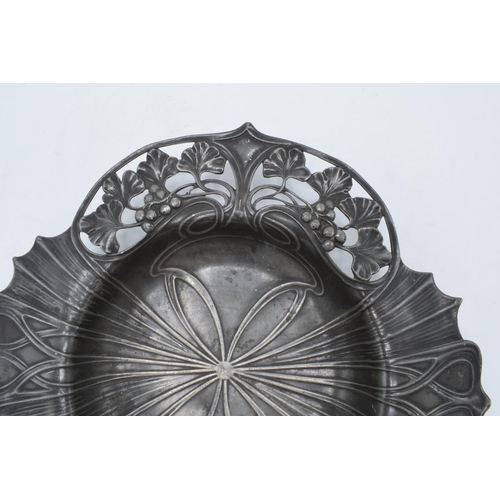 256 - An Art Nouveau WMF pewter dish raised on 4 ball feet stamped 'WMF'. 26cm long .In good condition wit... 