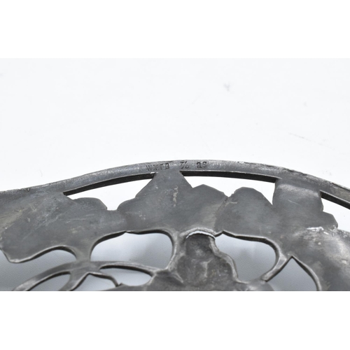 256 - An Art Nouveau WMF pewter dish raised on 4 ball feet stamped 'WMF'. 26cm long .In good condition wit... 