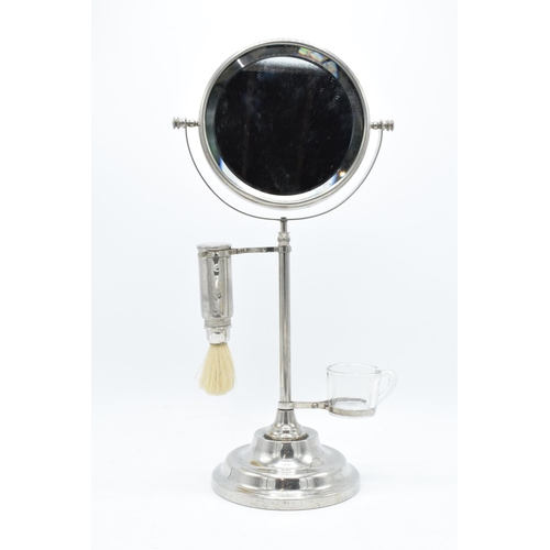 261 - A chrome plated adjustable gentleman's shaving stand complete with an associated jug and brush. The ... 