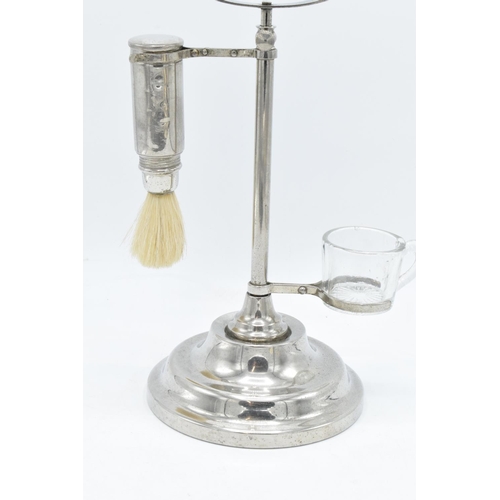 261 - A chrome plated adjustable gentleman's shaving stand complete with an associated jug and brush. The ... 