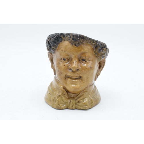 264 - A 19th century Bernard Bloch stoneware tobacco jar in the form a boy, impressed marks to base 'BB'. ... 