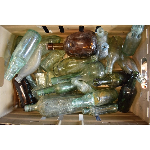 269B - A collection of vintage glass bottles to include various local interest such as William Stretch Ltd ... 