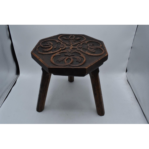 271 - Arts & crafts carved oak Stool. 31cm tall. In good condition.