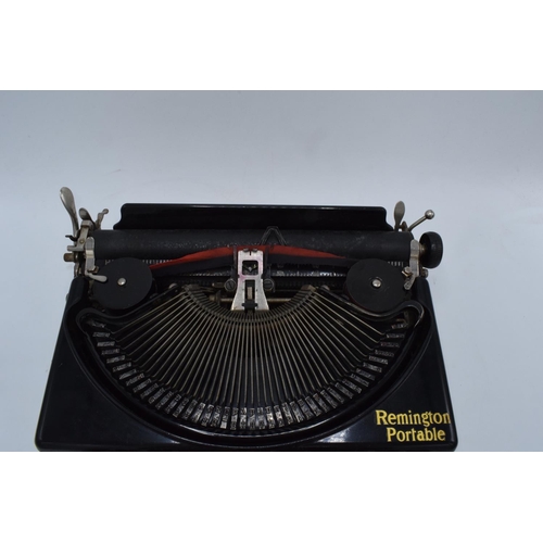 272 - Cased Remington Portable typewriter. Sold as spares/ repairs. Untested.