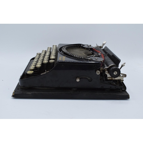 272 - Cased Remington Portable typewriter. Sold as spares/ repairs. Untested.