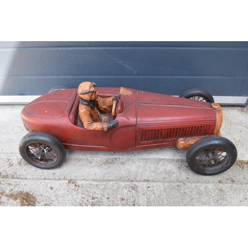 280 - A vintage Reprocrafters style large model of a vintage car. 75cm long. In good condition generally t... 