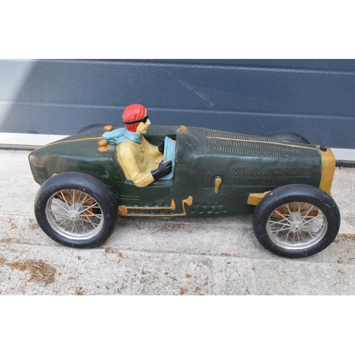 281 - A vintage Reprocrafters style large model of a vintage car. 67cm long. In good condition generally t... 