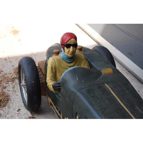 281 - A vintage Reprocrafters style large model of a vintage car. 67cm long. In good condition generally t... 