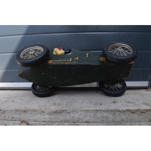 281 - A vintage Reprocrafters style large model of a vintage car. 67cm long. In good condition generally t... 