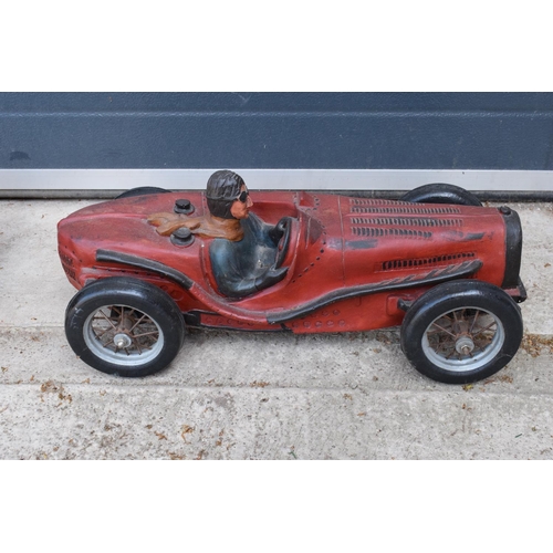 282 - A vintage Reprocrafters style large model of a vintage car. 56cm long togerher with a similar exampl... 