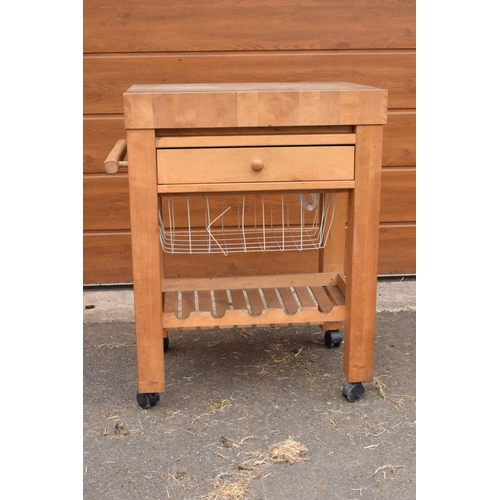 289 - A modern 20th century mounted butcher's block on wheels with a drawer. 70 x 52 x 85cm. In good funct... 