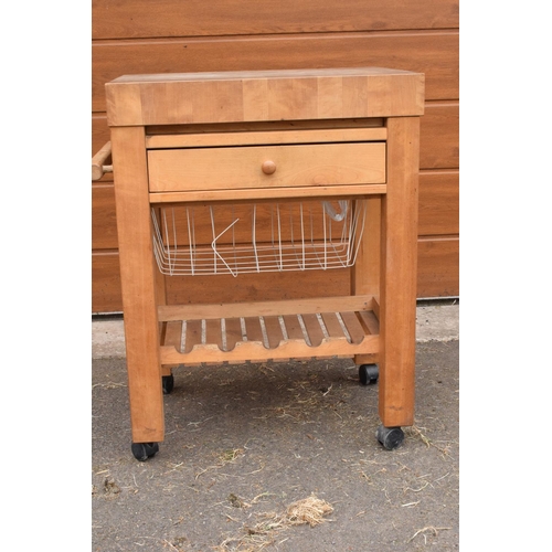 289 - A modern 20th century mounted butcher's block on wheels with a drawer. 70 x 52 x 85cm. In good funct... 