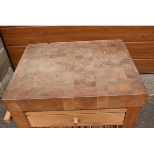 289 - A modern 20th century mounted butcher's block on wheels with a drawer. 70 x 52 x 85cm. In good funct... 