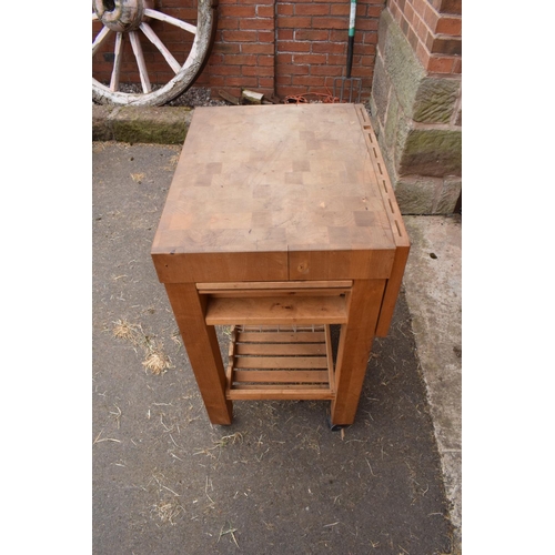 289 - A modern 20th century mounted butcher's block on wheels with a drawer. 70 x 52 x 85cm. In good funct... 