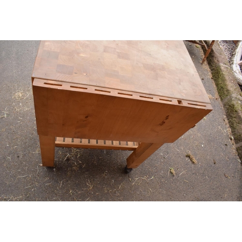 289 - A modern 20th century mounted butcher's block on wheels with a drawer. 70 x 52 x 85cm. In good funct... 