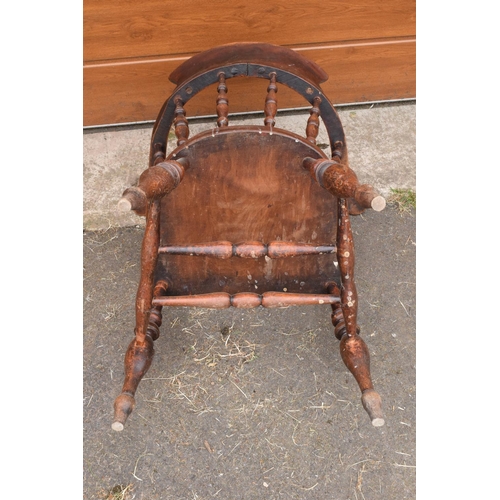 292 - A late 19th century elm or similar wood captain's chair. 79cm tall. In good functional condition tho... 