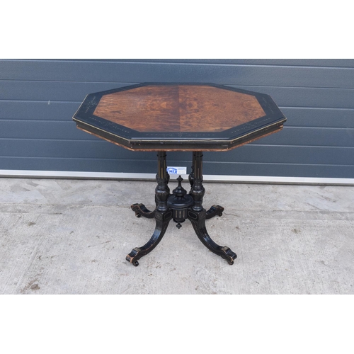 297 - Victorian ebonised aesthetic movement octagonal centre table with brass beading and chamfered edges ... 