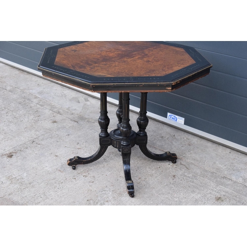 297 - Victorian ebonised aesthetic movement octagonal centre table with brass beading and chamfered edges ... 