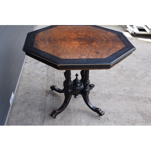 297 - Victorian ebonised aesthetic movement octagonal centre table with brass beading and chamfered edges ... 