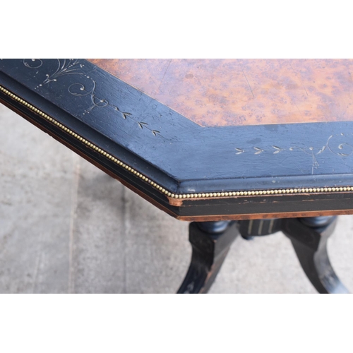 297 - Victorian ebonised aesthetic movement octagonal centre table with brass beading and chamfered edges ... 