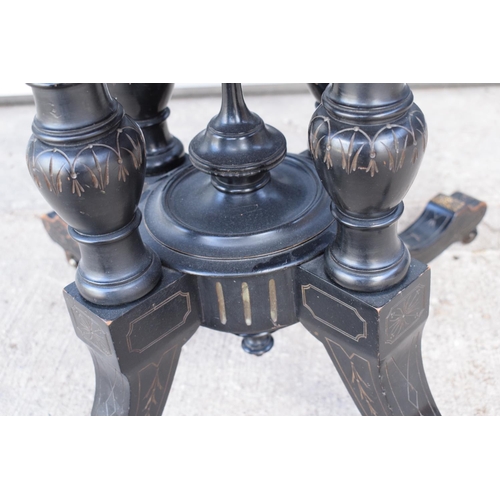 297 - Victorian ebonised aesthetic movement octagonal centre table with brass beading and chamfered edges ... 