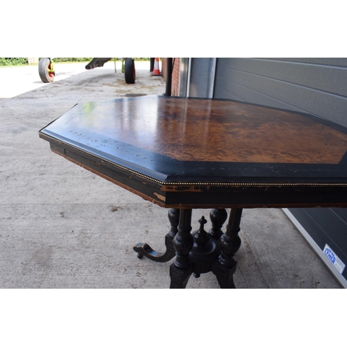 297 - Victorian ebonised aesthetic movement octagonal centre table with brass beading and chamfered edges ... 