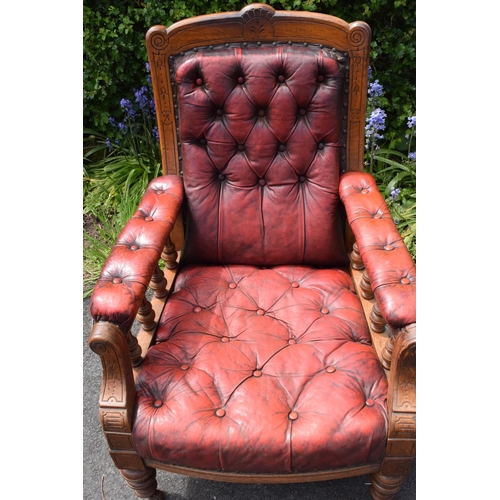 304 - Late Victorian walnut gentleman's Chesterfield style library chair with button back leather upholste... 