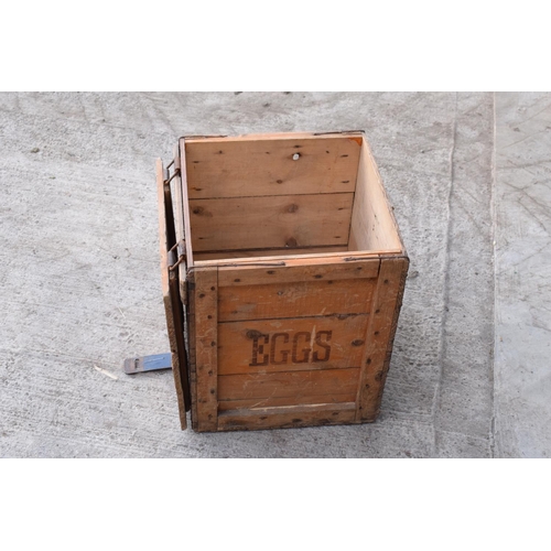 313 - A vintage 20th century wooden egg crate with either 'WCB' or 'WGB' with 'EGGS' on each side and a bo... 