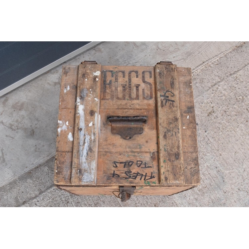 315 - A vintage 20th century wooden egg crate with either 'WCB' or 'WGB' with 'EGGS' on each side and a bo... 