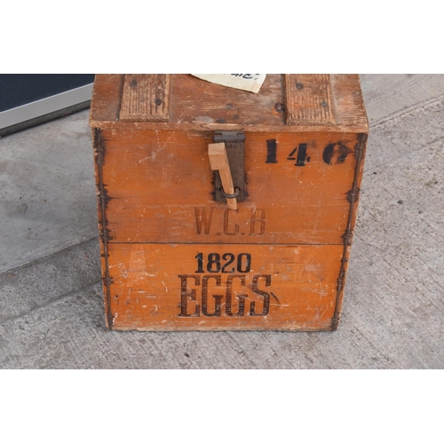 316 - A vintage 20th century wooden egg crate with either 'WCB' or 'WGB' with 'EGGS' on each side and a bo... 