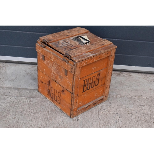 316 - A vintage 20th century wooden egg crate with either 'WCB' or 'WGB' with 'EGGS' on each side and a bo... 